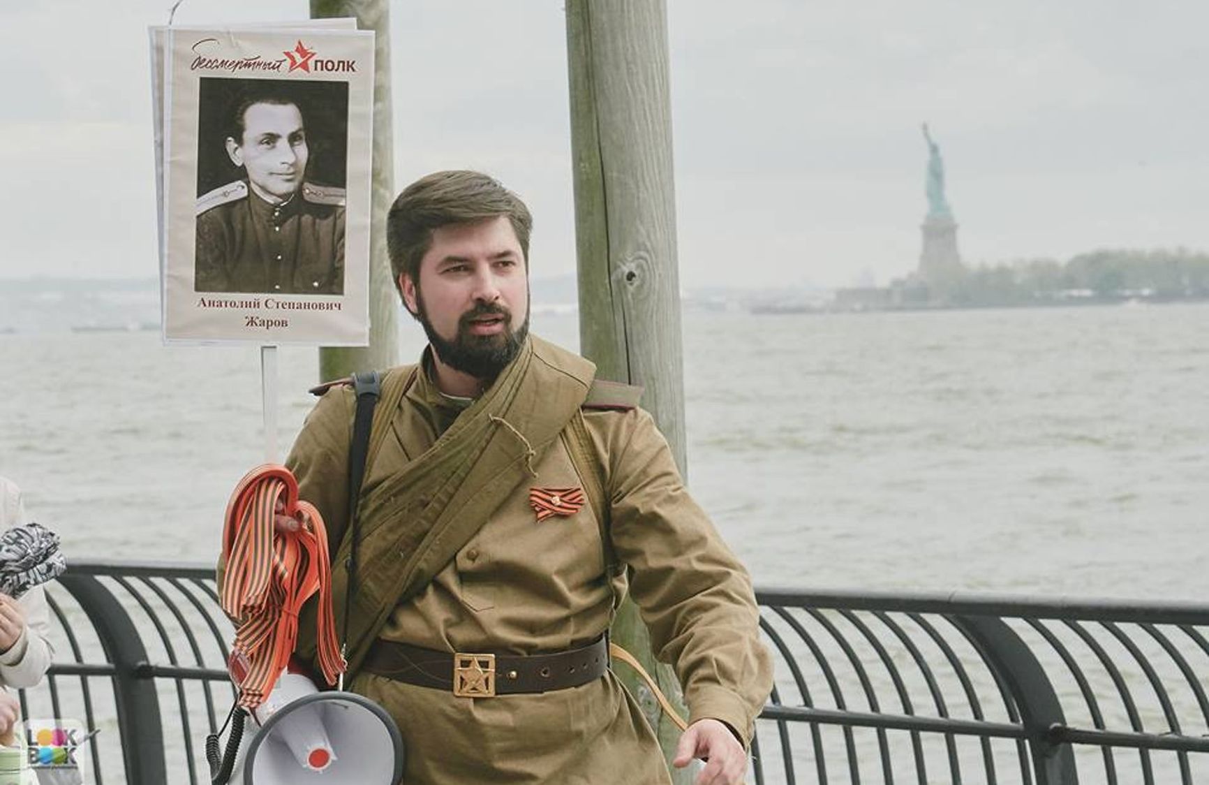 Igor Kochan with the Statue of Liberty in background